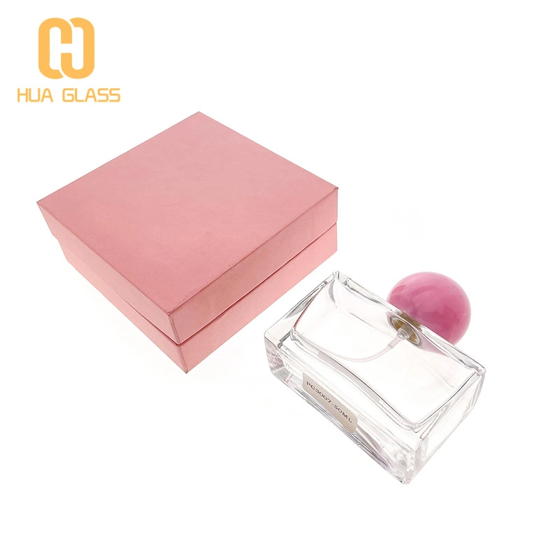 Frasco de perfume cuadrado de 50 ml con tapa de bola rosa  
