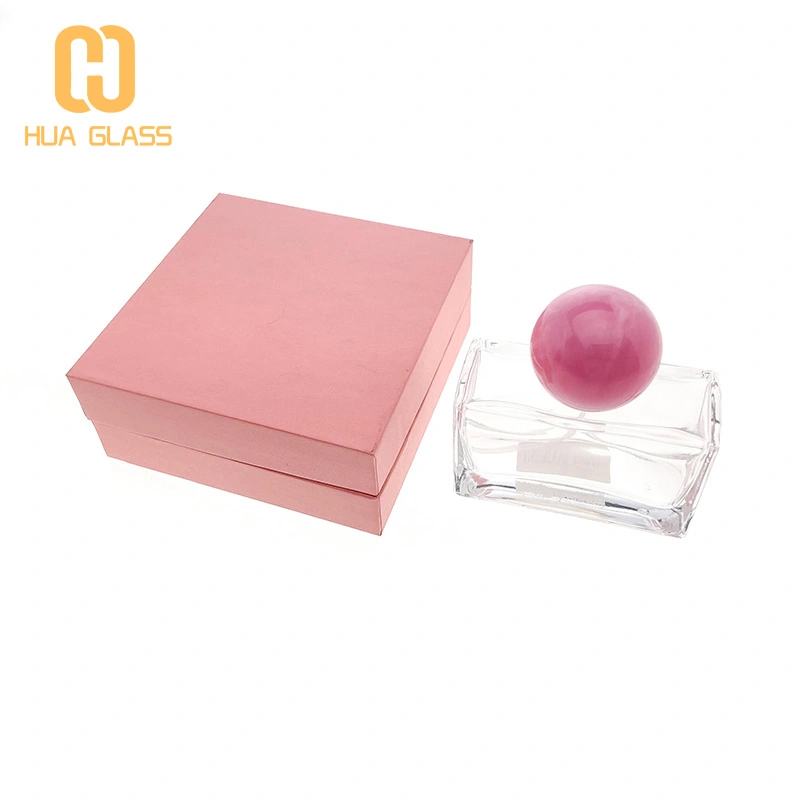 Frasco de perfume cuadrado de 50 ml con tapa de bola rosa  