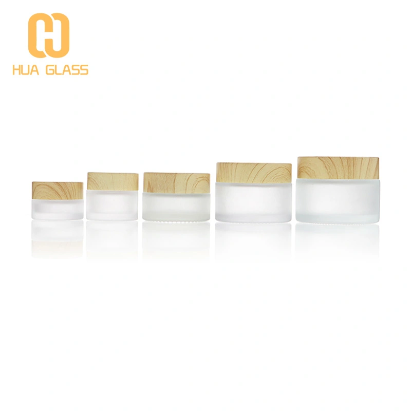 زجاجة مستحضرات التجميل من الزجاج الشفاف المتجمد مع غطاء من البلاستيك الخشبي