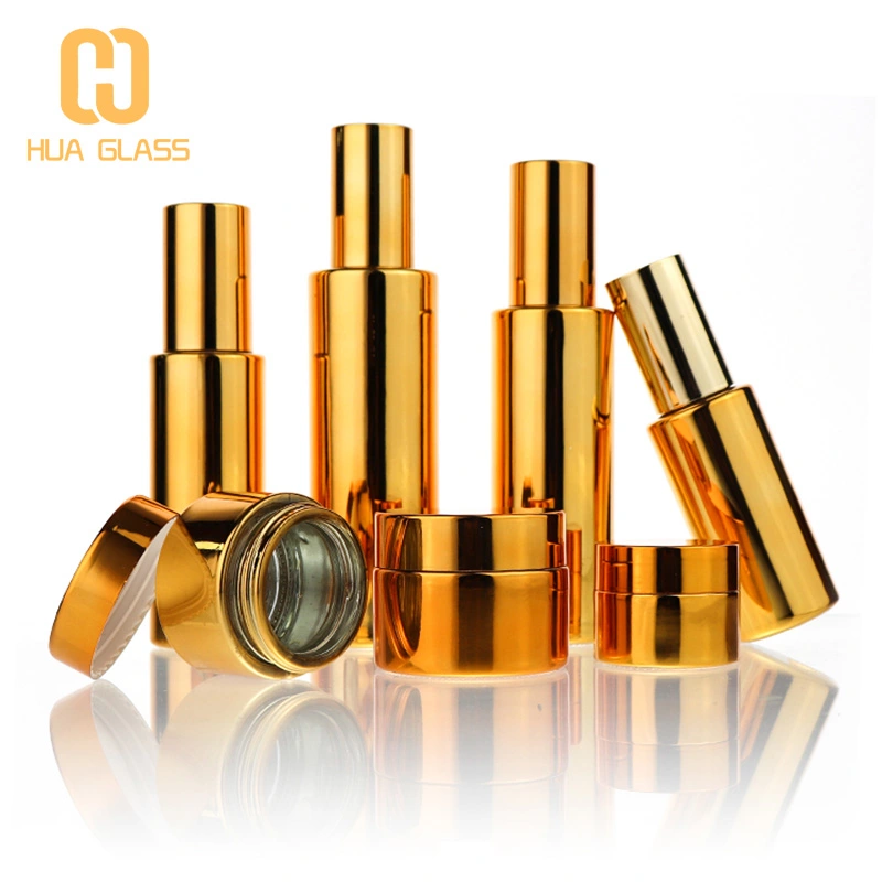 ensemble de bouteilles en verre cosmétique plaqué or et ruban  