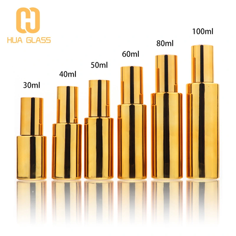 ensemble de bouteilles en verre cosmétique plaqué or et ruban  