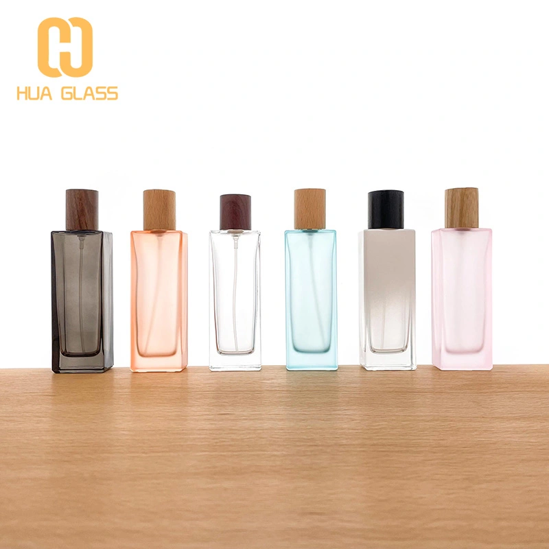 Botella de perfume redonda de cilindro de vidrio de pendiente vacía al por mayor