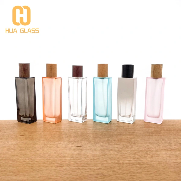 Botella de perfume redonda de cilindro de vidrio de pendiente vacía al por mayor