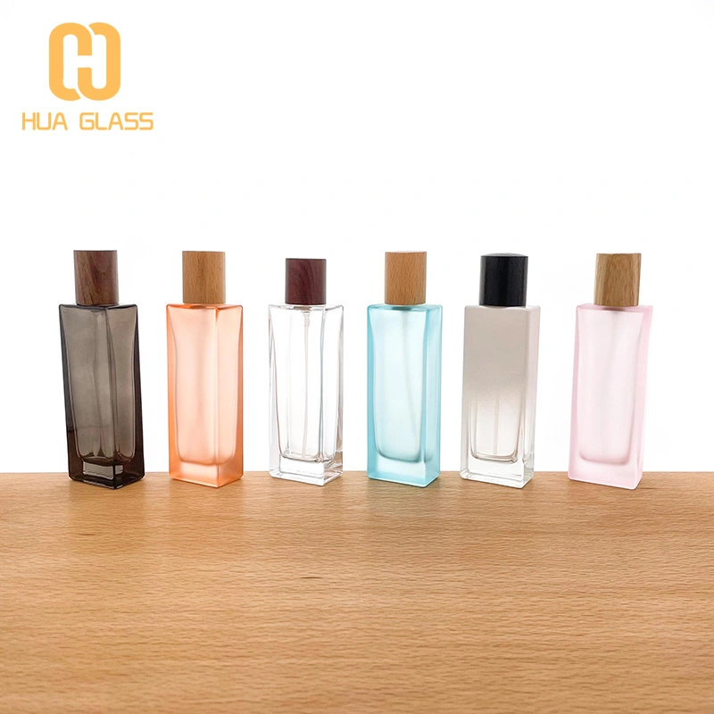 Botella de perfume redonda de cilindro de vidrio de pendiente vacía al por mayor