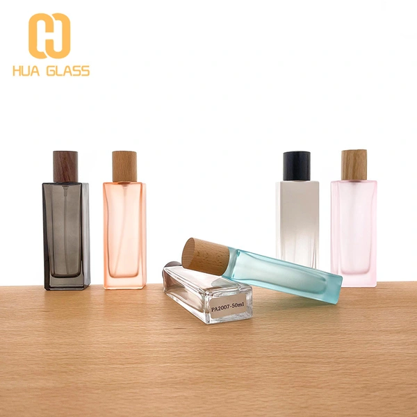 Botella de perfume redonda de cilindro de vidrio de pendiente vacía al por mayor