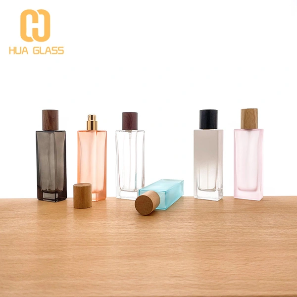 Botella de perfume redonda de cilindro de vidrio de pendiente vacía al por mayor