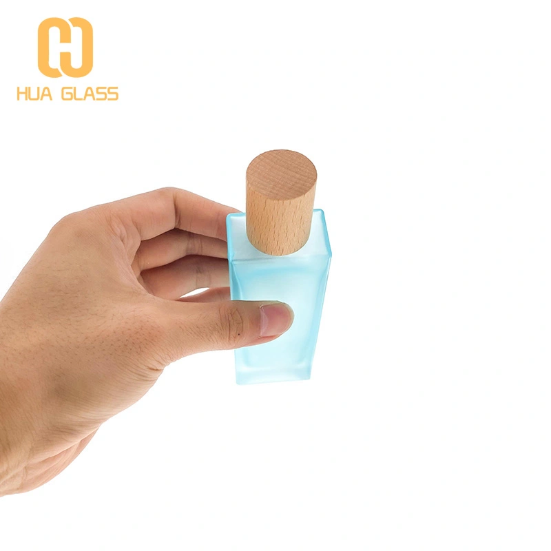 Botella de perfume redonda de cilindro de vidrio de pendiente vacía al por mayor