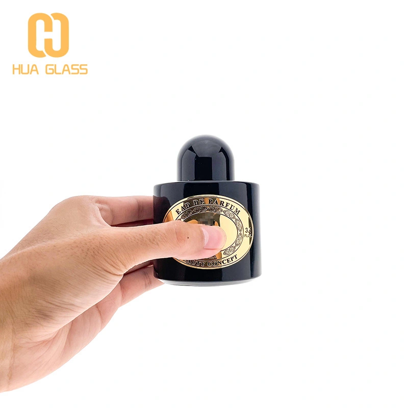 Flacon de parfum rond noir de 50 ml à 100 ml avec boîte à cylindre  