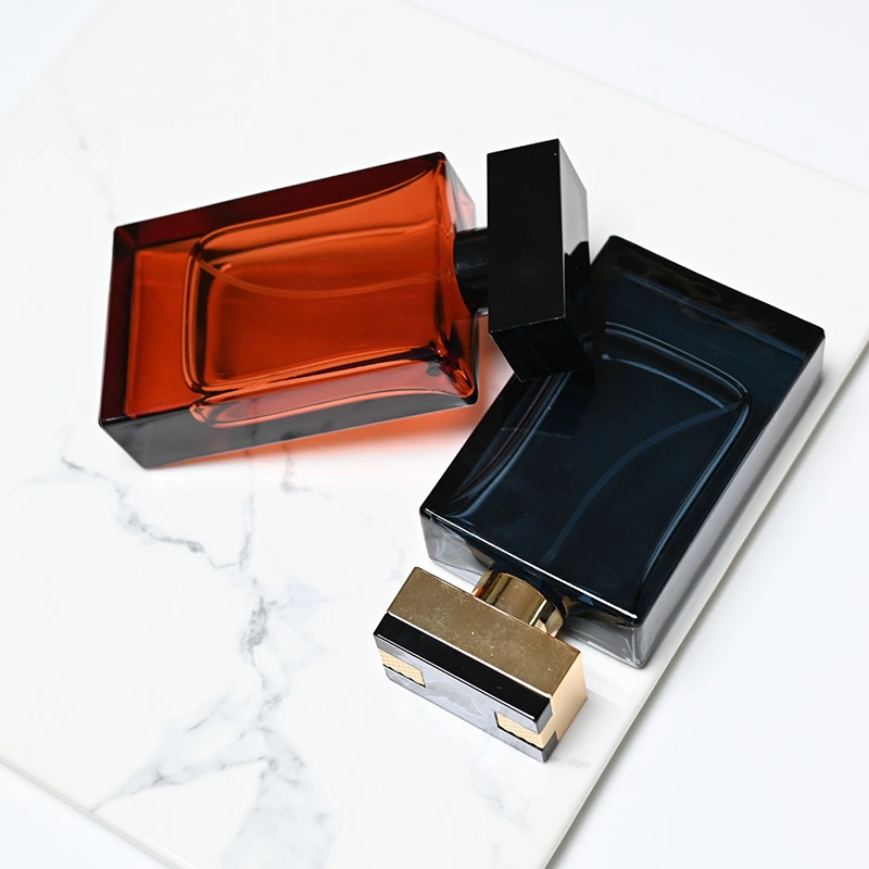 Botella de perfume rectangular de vidrio de color de lujo de 50 ml para mujeres y hombres