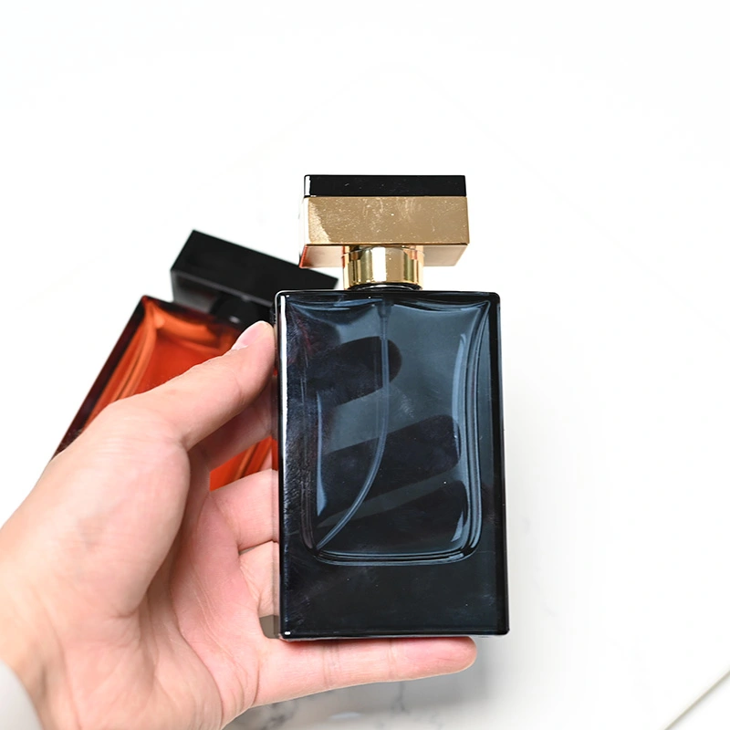 Botella de perfume rectangular de vidrio de color de lujo de 50 ml para mujeres y hombres