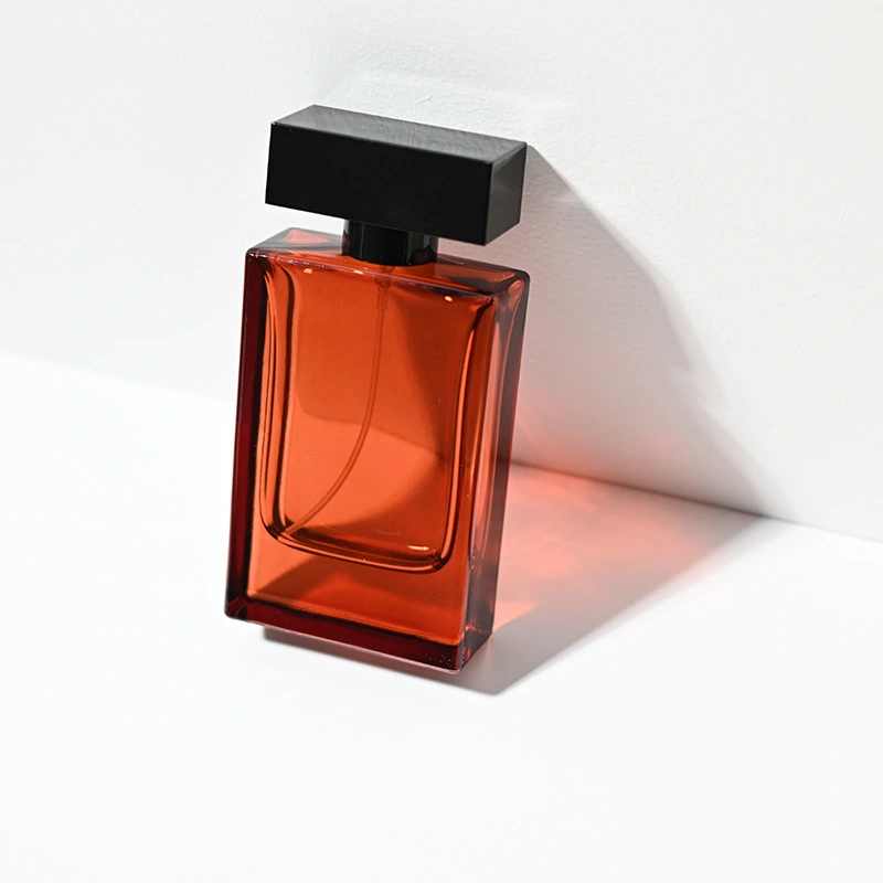 Botella de perfume rectangular de vidrio de color de lujo de 50 ml para mujeres y hombres