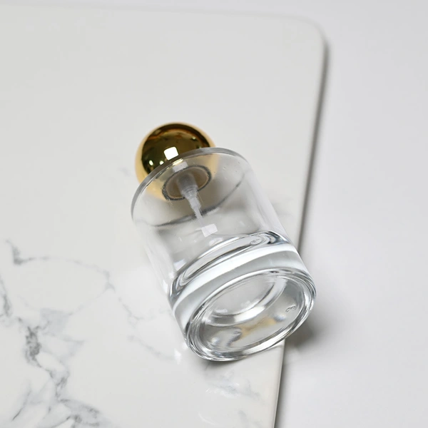 Frasco de perfume redondo de vidrio transparente de lujo de 50 ml con tapa de bola