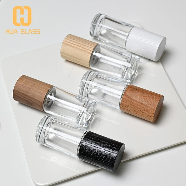 Frasco de perfume redondo cilíndrico de 50 ml con tapa de madera