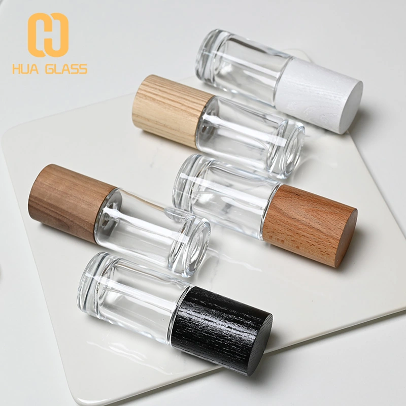 Frasco de perfume redondo cilíndrico de 50 ml con tapa de madera  