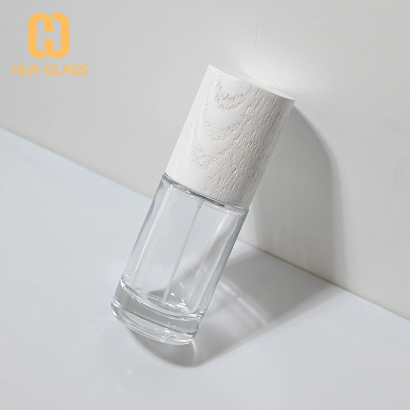 Frasco de perfume redondo cilíndrico de 50 ml con tapa de madera  