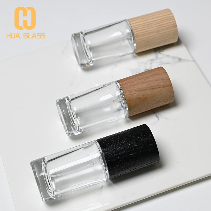 Frasco de perfume redondo cilíndrico de 50 ml con tapa de madera  