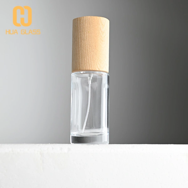 Frasco de perfume redondo más alto de 50 ml con tapa de madera