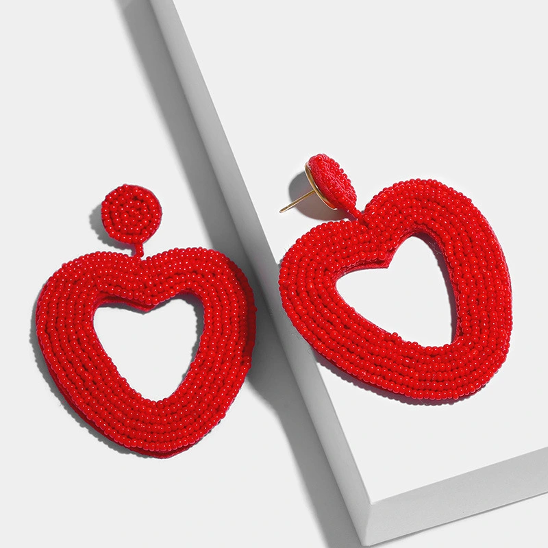 Wholesale love rice bead earrings female temperament peach heart earrings personality simple versatile earrings earrings erp78