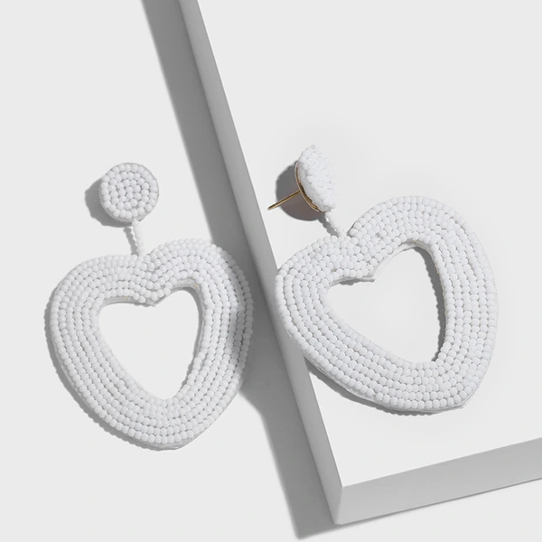 Wholesale love rice bead earrings female temperament peach heart earrings personality simple versatile earrings earrings erp78