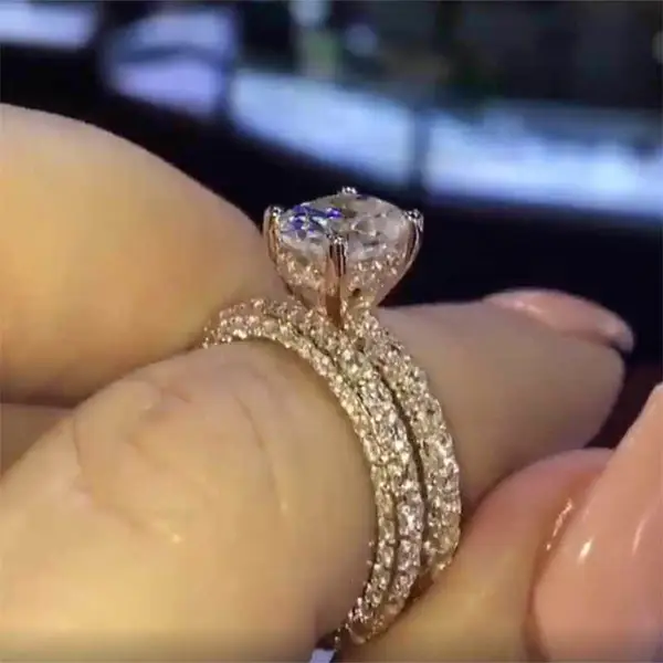 Hot selling diamond oval four claw princess copper ring European and American fashion engagement proposal ring for women