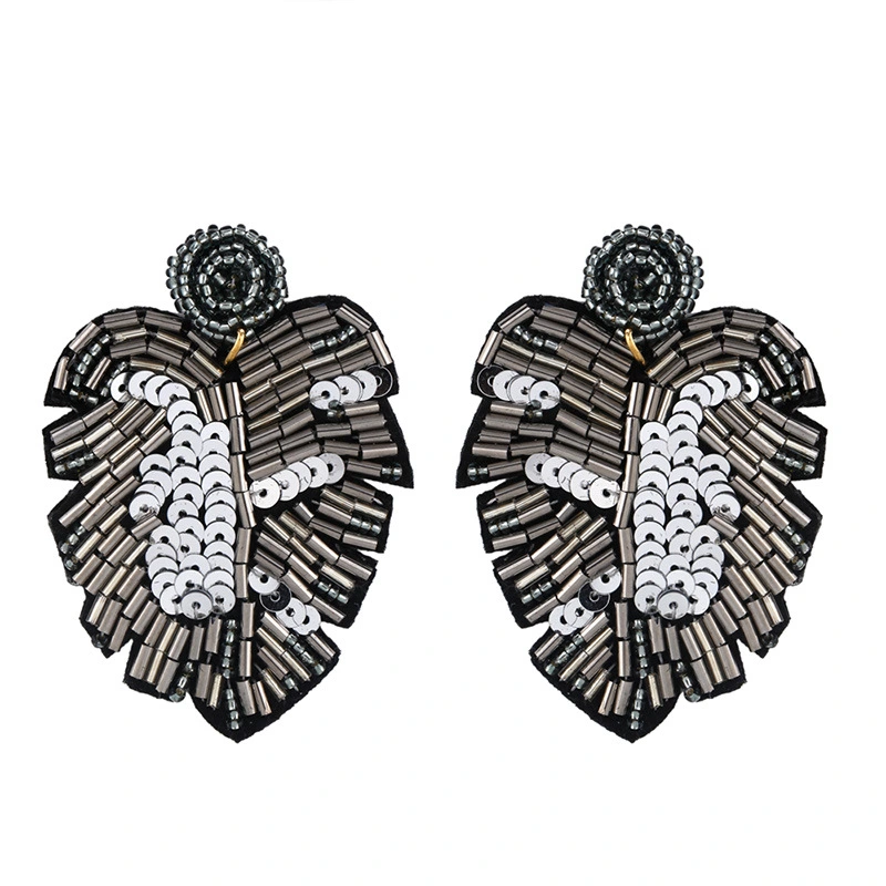 Creative new earrings Bohemian leaf rice bead earrings female exaggerated personality earrings source erq85