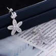   Hot selling new Korean sweet temperament girls full zircon flower earrings earrings high-end jewelry