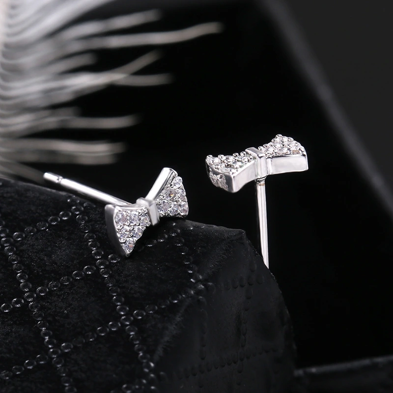 Hot selling hot item in Dongdaemun, Korea, sweet and cute bow-knot zircon earrings, fashionable and versatile earrings for girls