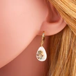 Pearl earrings European and American devil's eye micro-inlaid colored diamond earrings water drop round geometric earrings female err52