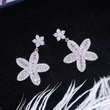   Hot selling new Korean sweet temperament girls full zircon flower earrings earrings high-end jewelry