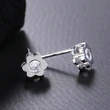  Japanese daily versatile zircon flower earrings goddess student simple matching earrings copper plated with real gold