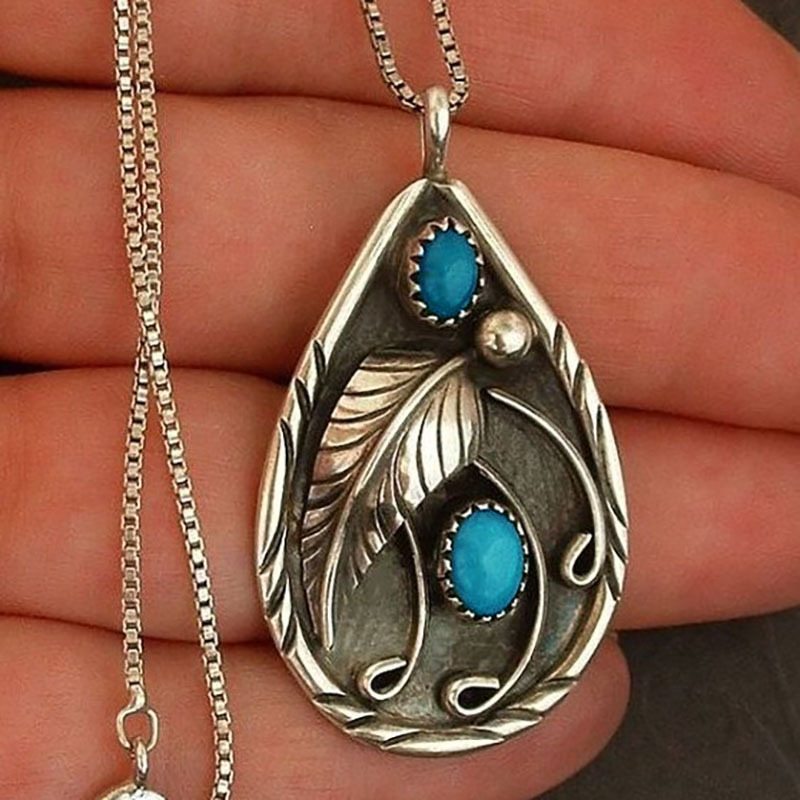  New European and American style retro teardrop-shaped women's necklace creative relief feather inlaid turquoise pendant