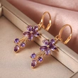 E-commerce European and American fashion OL women's floral earrings copper inlaid zircon electroplated earrings wholesale