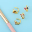 2023 European and American exaggerated personality foot ear clip jewelry C-shaped color diamond five-pointed star ear bone clip female eru47