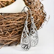  Jewelry wholesale retro style women's hollow leaf earrings European and American fashion exaggerated earrings hot sale
