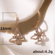   New creative rose gold butterfly women's zircon earrings European and American ear clip earrings wholesale