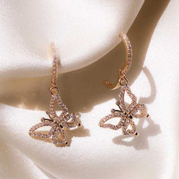   New creative rose gold butterfly women's zircon earrings European and American ear clip earrings wholesale