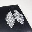Korean new hollow leaf earrings female earrings earrings wholesale alloy earrings earrings era05
