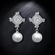 New jewelry geometric zircon pearl earrings female comfortable non-pierced ear clip high-end earrings erj34