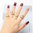 AS jewelry smooth 26 English letters ring female copper plated real gold open ring rih04