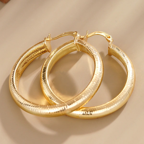 Middle Eastern hot-selling earrings for women with striped metal texture accessories, manufacturers of European and American new styles