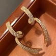  European and American gold-plated personalized earrings for women, geometric lines, ribbon accessories, fashionable and light luxury popular jewelry