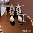 Celebrity temperament horse eye leaf earrings female teardrop-shaped imitation pearl jewelry light luxury fairy lady earrings