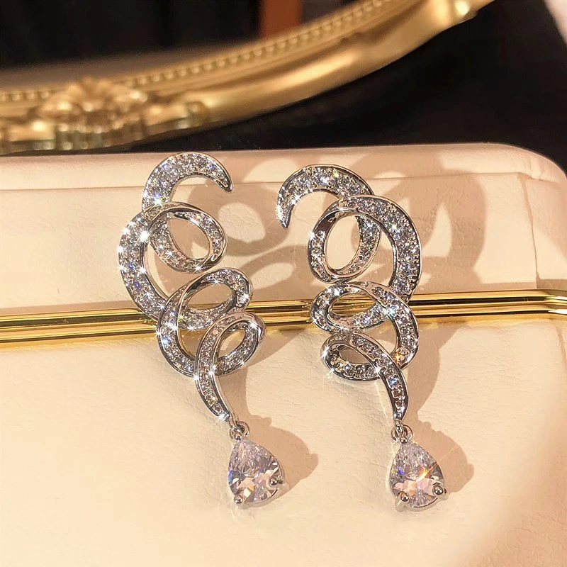  European and American cross-geometric line earrings for women inlaid with zircon, sparkling water drop design earrings for banquets, light luxury style