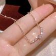 Light luxury geometric necklace for women, copper-plated platinum color gold rose gold clavicle chain simple smile pendant