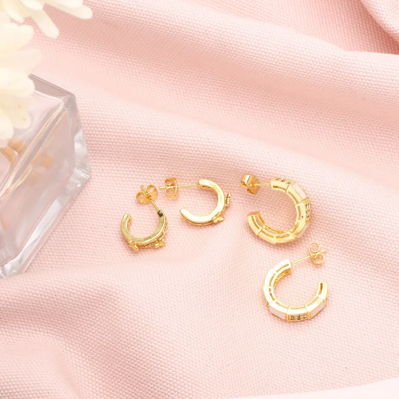 Clearance workplace style commuting versatile C-shaped earrings design sense zircon shell earrings European and American earrings wholesale erz13