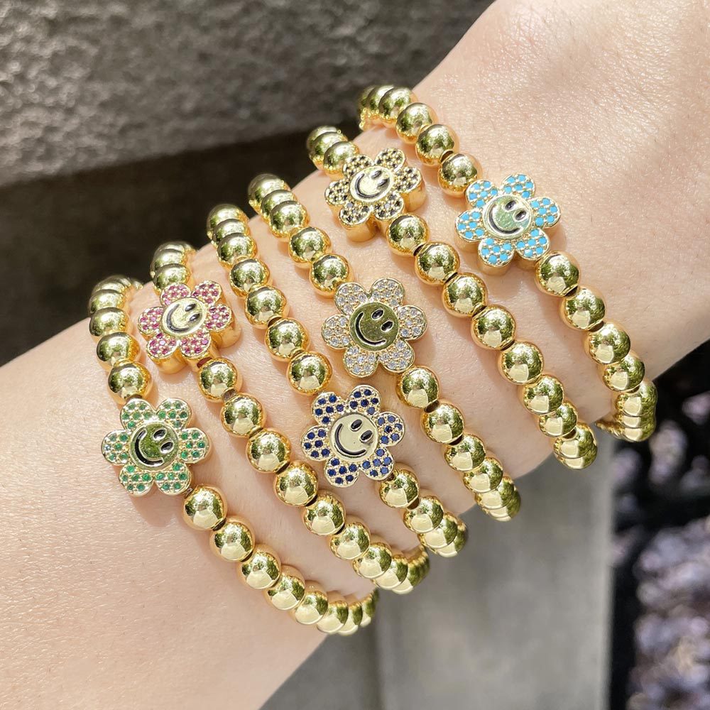 Clearance handmade gold-plated round bead bracelet European and American sunflower smiley face expression bracelet jewelry brg86