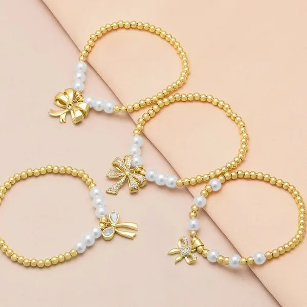 AS jewelry hot selling bow pendant bracelet female gold-plated zircon pearl bracelet bre53
