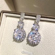 Domineering style temperament round super flash earrings French temperament Hong Kong style banquet light luxury earrings classic jewelry