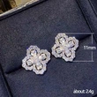 European and American classic four-leaf clover full diamond sequin earrings new floral micro-inlaid zircon earrings fashionable and delicate earrings