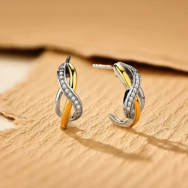   Hot selling metal electroplating two-color earrings fashionable personality cross design fashionable popular super hot style